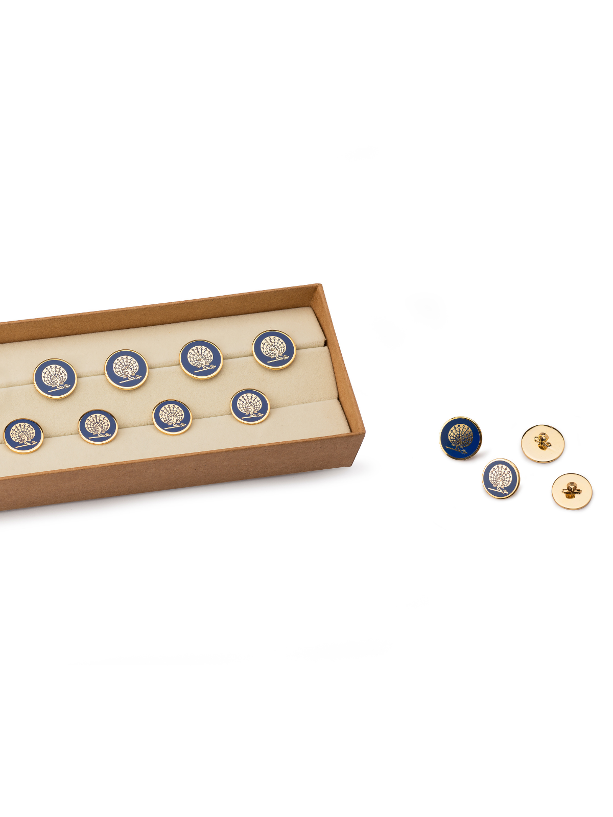 The impeccably finished gold and royal blue buttons